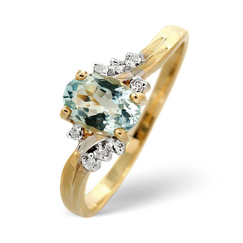 0.70 Ct Aquamarine and 0.03 Ct Diamond Twist Ring In 9 Carat Yellow Gold