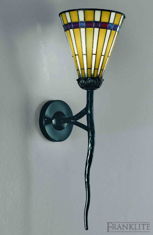 Black ironwork torchere style wall bracket with Tiffany glass shade.