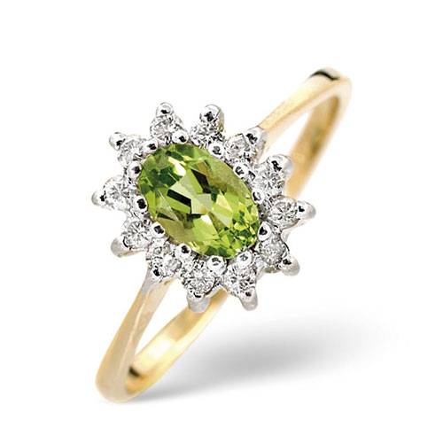 Diamond and Oval Cut Peridot Ring In 9 Carat Yellow Gold