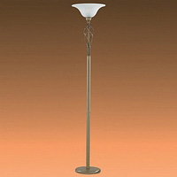 Attractive uplighter floor lamp finished in antique brass with metal-work design. Height - 179cm Wid