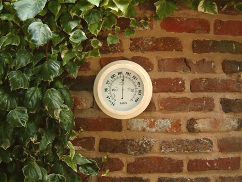 The second in the set matching the Antique clock /thermometer  this antique white barometer with sym