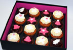 These delicious cupcakes are lovingly made and presented beautifully with handmade sugar decorations