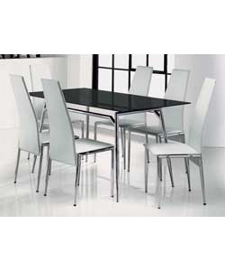 Dining table with a chrome metal frame and a black tempered glass top fixed with aluminium discs.Jav