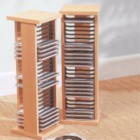 Handy pair of CD storage units. Easy home assembly. Size of each H51 x W16.5 x D16.5cm (20 x