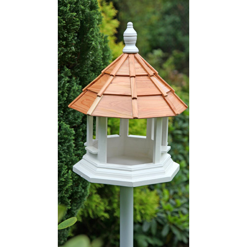 Large hexagonal feeding table on 1.52m wooden pole with cedar roof.